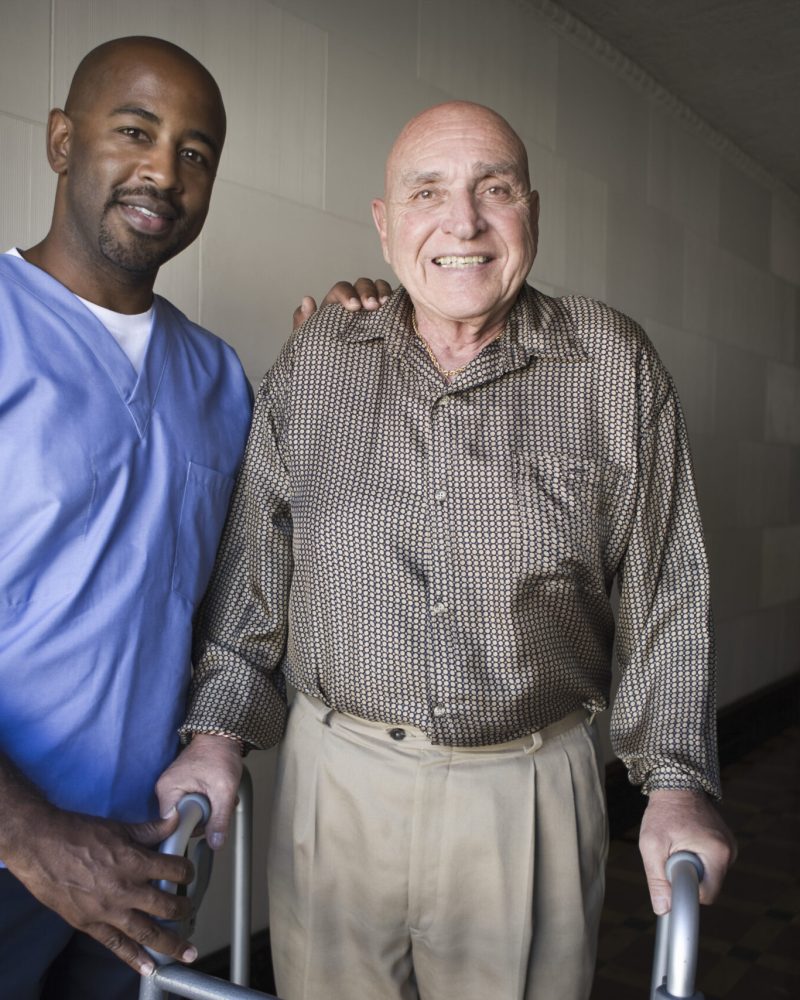 Portrait,Of,A,Male,Healthcare,Worker,With,Elderly,Man